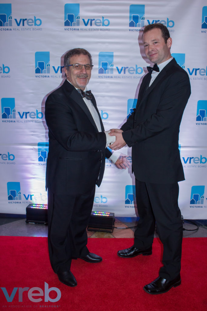 Don St. Germain (right) being presented the MLS Special Gold Award